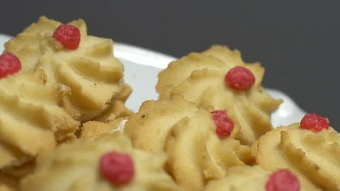 Close-up of various cookies in rotation. grey background. Stock Footage 101408725