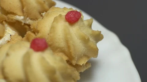 Close-up of various cookies in rotation. grey background. Stock Footage 101408958