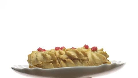 Close-up of various cookies in rotation. isolated on white. Stock Footage 101408438