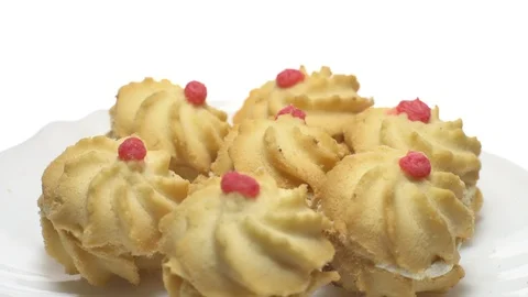 Close-up of various cookies in rotation. isolated on white. Stock Footage 101408469