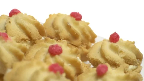 Close-up of various cookies in rotation. isolated on white. Stock Footage 101408802