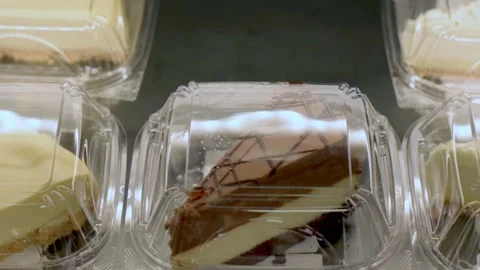 Close-up of various dessert slices, including cheesecake and chocolate cake Video stock 278017698