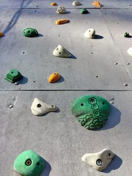 Close-up of various hooks on the wall for training in sport climbing Stock Photos