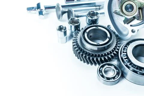Close-up of various mechanical components including gears and bearings on a Stock Photos