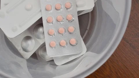 Close-up of various medications inside a container, representing options fo.. Stock Footage 261099406