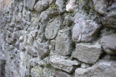 Close up of various shaped stone wall of medieval fortress. Fotos de archivo