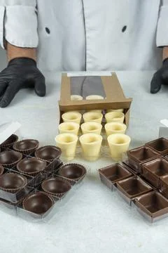 Close up of various types of chocolates in different shapes inside boxes ve.. Stock Photos