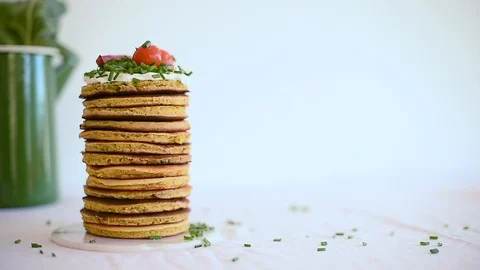 Close-up of vegan chickpea pancakes with camera moving from left to far right Stock Footage 88730234