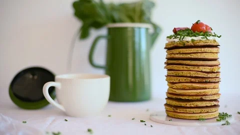 Close-up of vegan chickpea pancakes with camera moving from top to bottom Video stock 88730297
