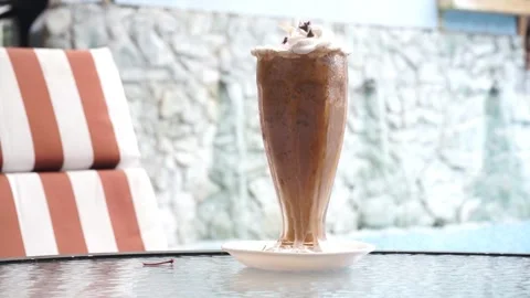 A close-up of a vegan chocolate milkshake Video stock 248565553
