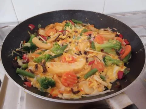 Close up of vegetable meal cooked in pan 스톡 사진