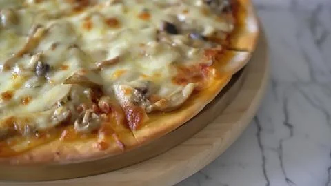 Close-up of vegetable pizza with cheese and toppings Stock Photos