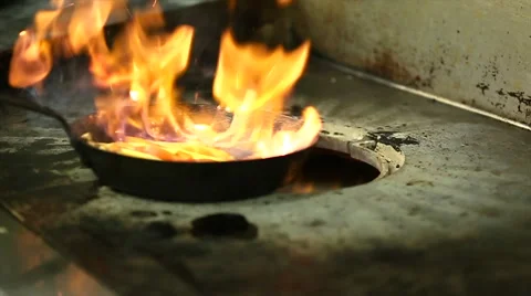 Close Up of Vegetables Being Flambéed Stock Footage 44085670