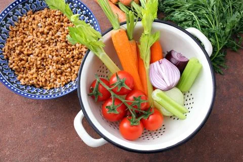 Close up of vegetables in colander Stock Photos