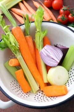 Close up of vegetables in colander Stock Photos