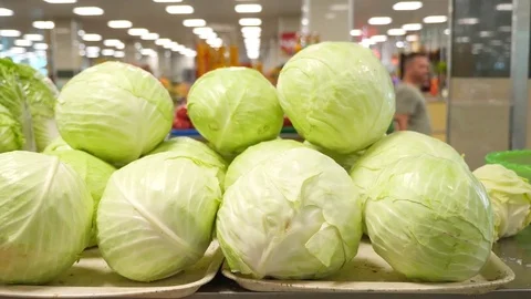 Close-up of vegetables on the counter is not a bazaar. White cabbage. 4k. Stock Footage 80478045