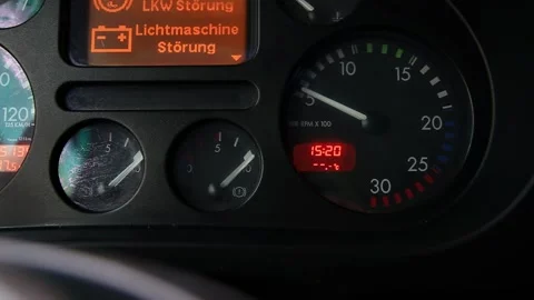 Close-up of vehicle dashboard, instrument cluster displaying gauges, digital Stock Footage 325699100