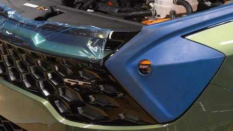 Close-Up of Vehicle Front During Factory Assembly Stock-Footage 346232805