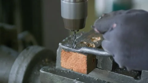 Close-Up of Vertical Drill Press Drilling into Metal – Workshop Precision Stock Footage 313862396