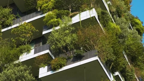Close up of vertical forest building with lush greenery and trees integrated Stock Footage 312818917