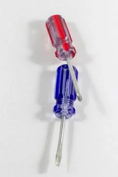 Close-up vertical shoot of small size cross positioned default screwdrivers Stock Photos