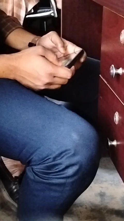 Close-up Vertical Shot of Hands Playing Puzzle Game on Smartphone Screen Stock Footage 323102933