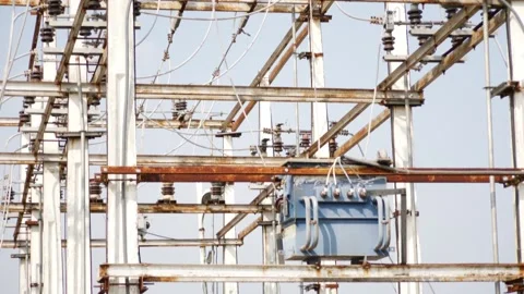 Close vertical shot of transformer placed on electric pillars Stock Footage 147858721