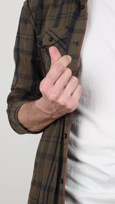 Close up vertical shows man hand, rubbing fingers mimic giving money 库存影片 307416952