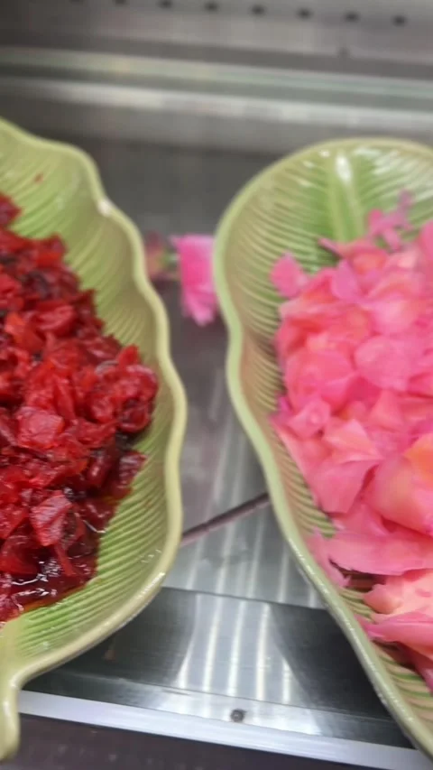 Close-up vertical video of red pickled ginger Stock Footage 322967609