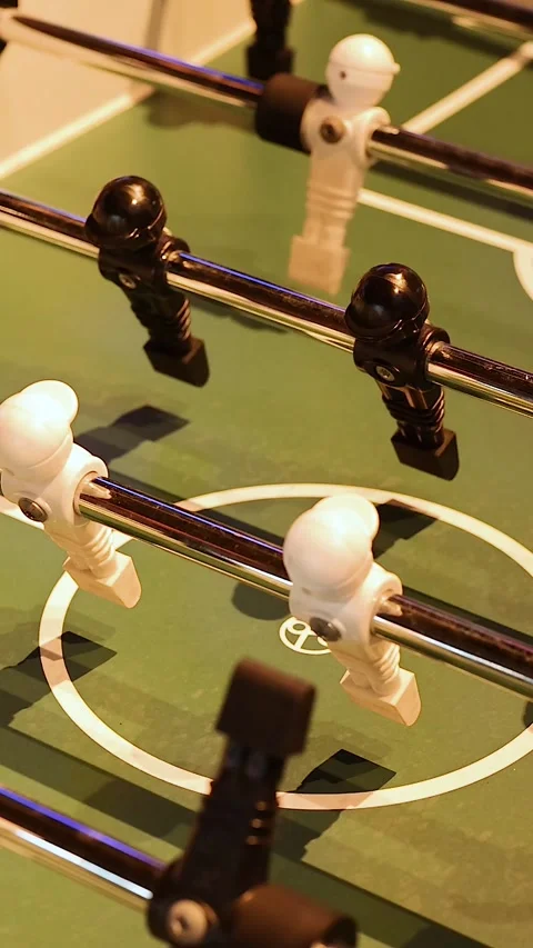 Close Up Vertical View of Foosball Table Figures in Motion Stock Footage 326026554