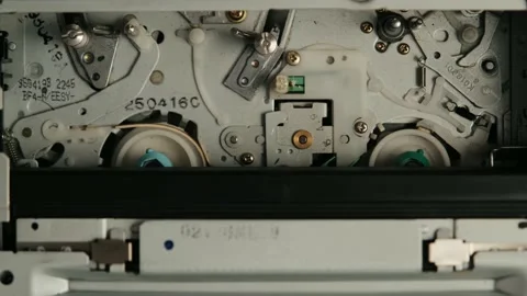 Close-up VHS video cassette recorder inside without tags. Tape inserting, play Stock Footage