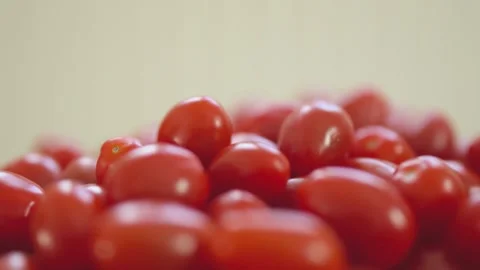 Close-up of vibrant, fresh red grape tomatoes grouped together Stock-Footage 296323781