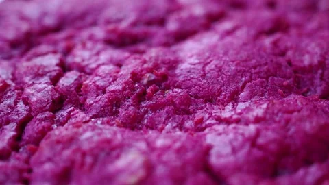 Close-up of a Vibrant Pink Beetroot Cookie Stock Footage 339829749