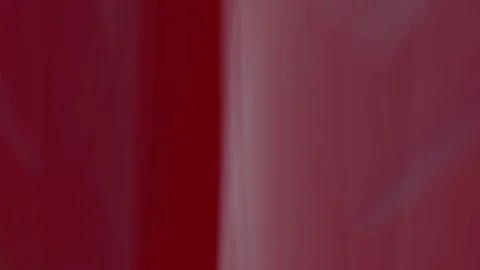 Close-up of a vibrant red curtain with soft lighting. Elegant fabric backdrop Stock Illustration