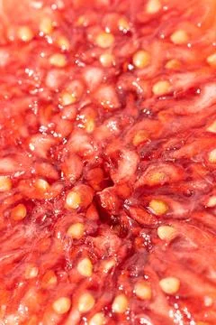 Close-up of vibrant red fig interior Stock Photos