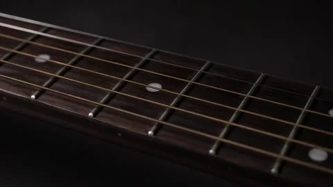 Close up of vibrating strings of an acoustic guitar Stock Footage 160562017