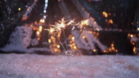 Close up video of bengal light in blurred background. Christmas sparklers. Stock Footage 166032300