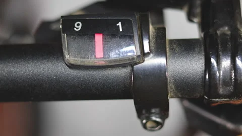Close-up video of a bicycle gear indicator display integrated into a black .. Stock Footage 310259548