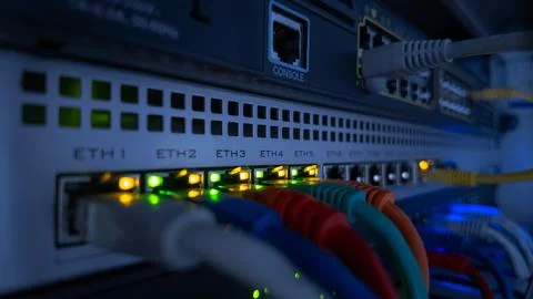 Close-up video of blinking LEDs on network switch showing data flow and con.. Stock Photos