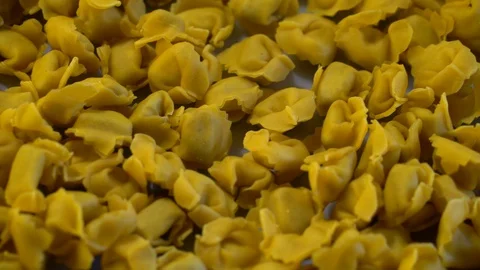 Close-up video of a bunch of raw handmade cappelletti Stock-Footage 100267958