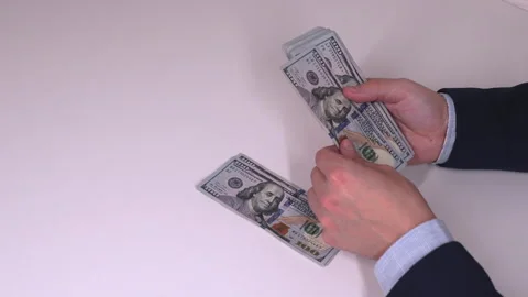Close up video of business in suit counting money at the table. Business, Stock Footage 342393071