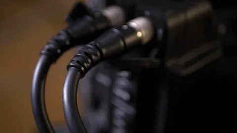 Close up a video cabling in the back of video camera. Stock Footage 99426121