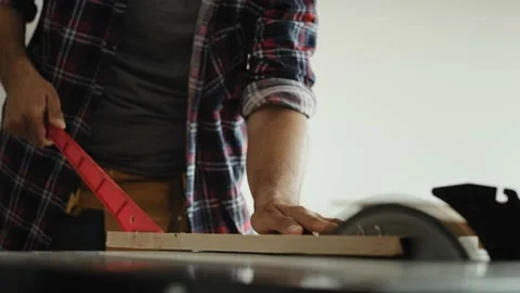 Close up video of carpenter using a circular saw Stock Footage 136724440
