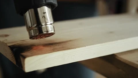 Close up video of carpenter using wood heat gun Stock Footage 136724305