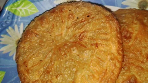 Close-up video of chonge, a traditional crispy, layered flatbread or sweet .. Stock Footage 337037971