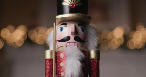 Close up video of classic Nutcracker figurine, framed by twinkling bokeh lights, Stock Footage 287177020
