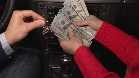 Close up video of counting and transferring money for the car. Business, Stock Footage 313505688