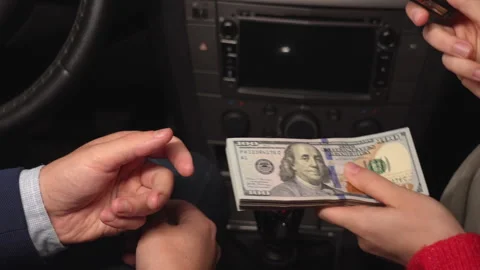 Close up video of counting and transferring money for the car. Business, Stock Footage 320908561