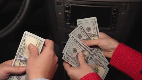 Close up video of counting and transferring money for the car. Business, Stock-Footage 342392842