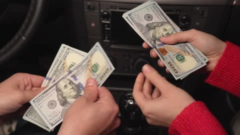 Close up video of counting and transferring money for the car. Business, Stock-Footage 342396114